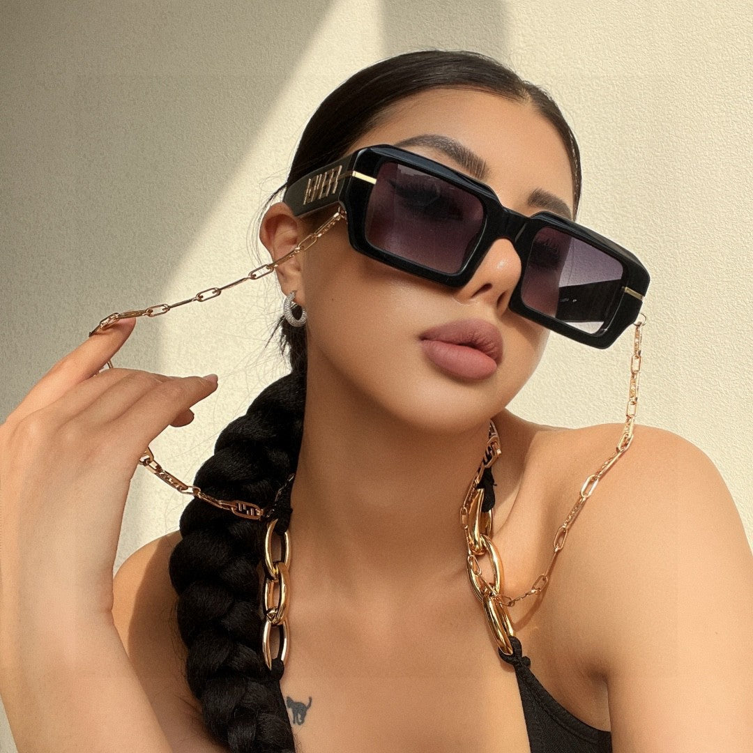 FENDI EMBOSSED LOGO DIAGONAL RECTANGULAR SUNGLASSES 563312 IN ACETATE