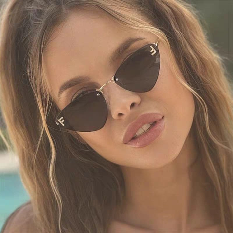 FENDI SKY RIMLESS TRIANGLE FRAME SUNGLASSES 566724 IN METAL