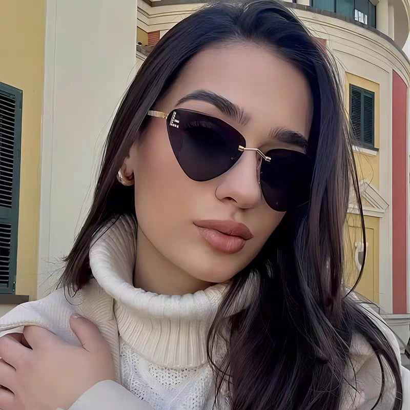 FENDI SKY RIMLESS TRIANGLE FRAME SUNGLASSES 566724 IN METAL