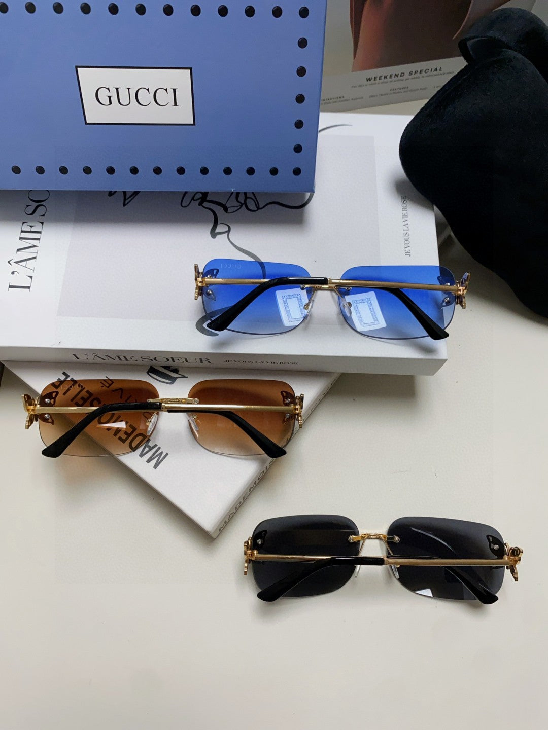 GUCCI BUTTERFLY EMBELLISHED RIMLESS RECTANGULAR FRAME SUNGLASSES 570245 IN METAL