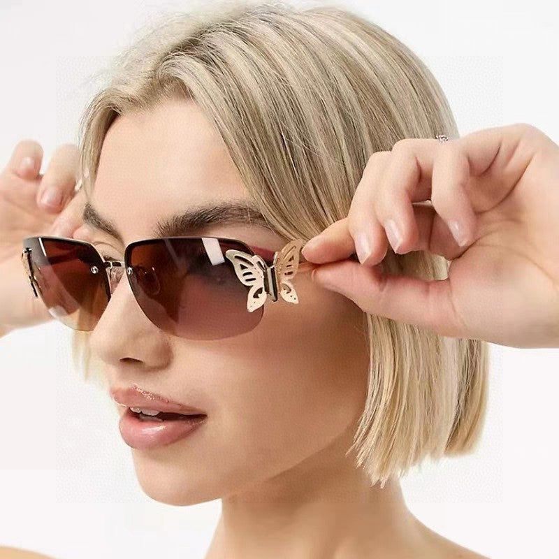 GUCCI BUTTERFLY EMBELLISHED RIMLESS RECTANGULAR FRAME SUNGLASSES 570245 IN METAL