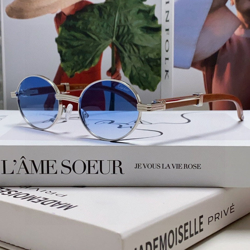 CARTIER PREMIÈRE ROUND FRAME SUNGLASSES CT0464S IN METAL