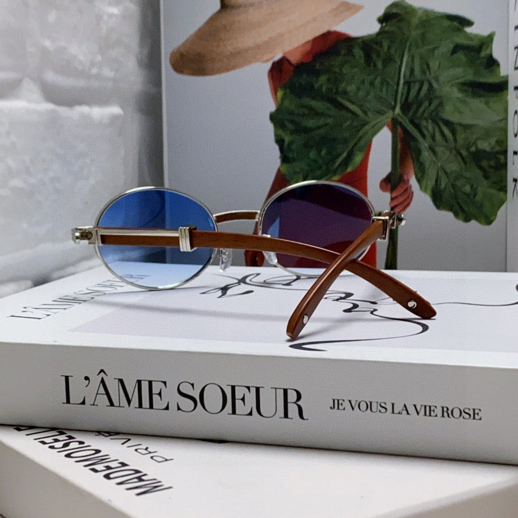 CARTIER PREMIÈRE ROUND FRAME SUNGLASSES CT0464S IN METAL