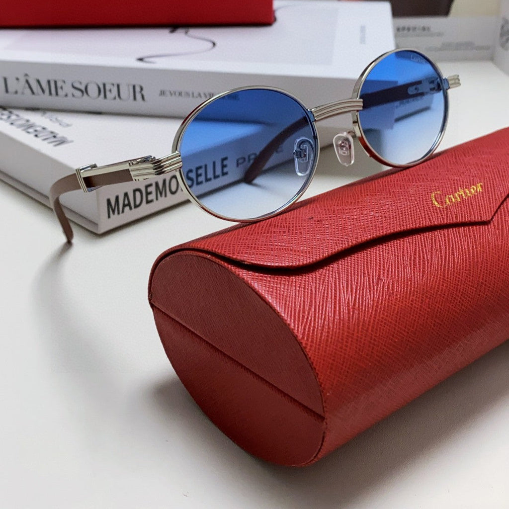 CARTIER PREMIÈRE ROUND FRAME SUNGLASSES CT0464S IN METAL