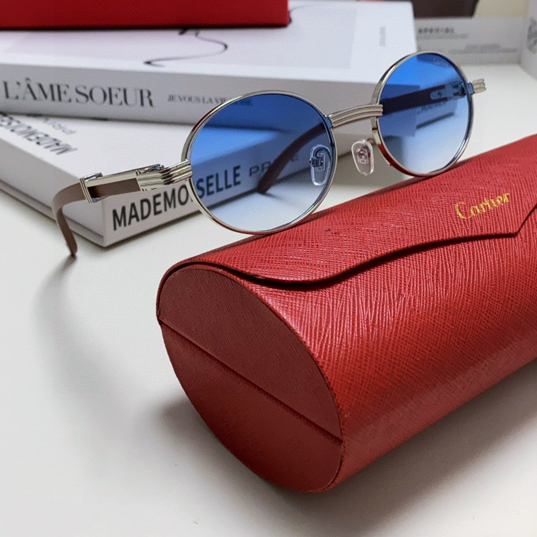 CARTIER PREMIÈRE ROUND FRAME SUNGLASSES CT0464S IN METAL