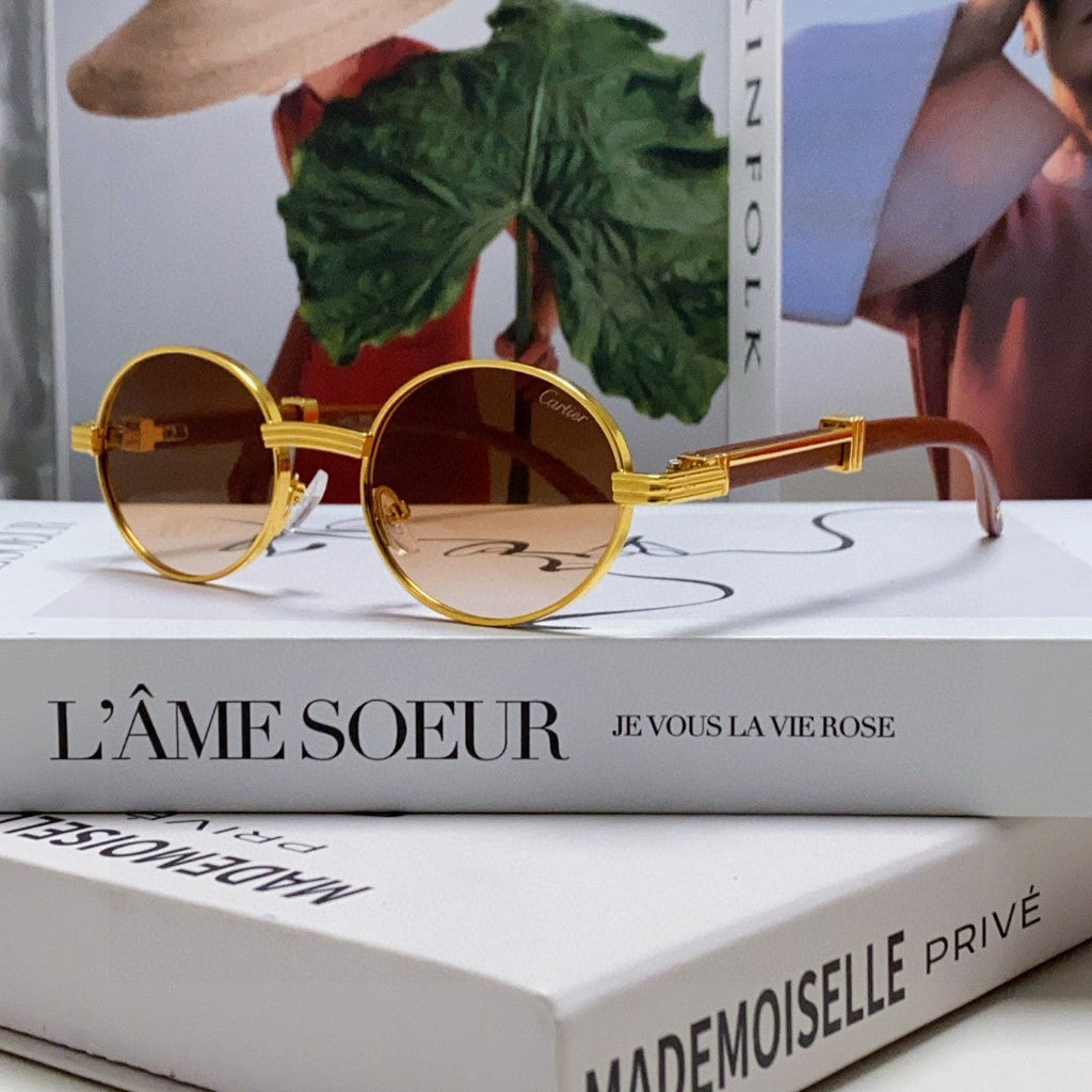 CARTIER PREMIÈRE ROUND FRAME SUNGLASSES CT0464S IN METAL