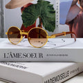 CARTIER PREMIÈRE ROUND FRAME SUNGLASSES CT0464S IN METAL