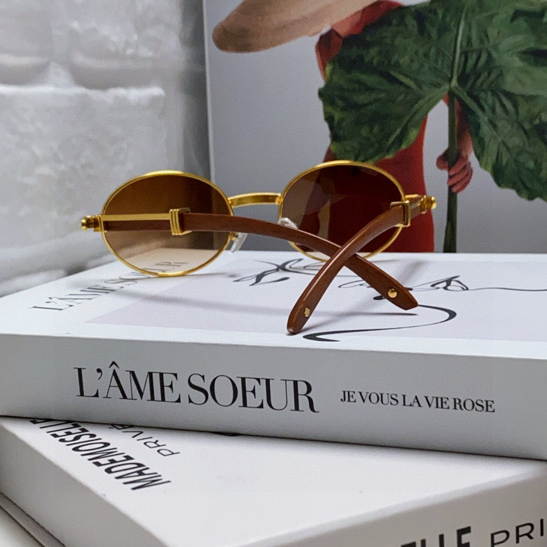 CARTIER PREMIÈRE ROUND FRAME SUNGLASSES CT0464S IN METAL