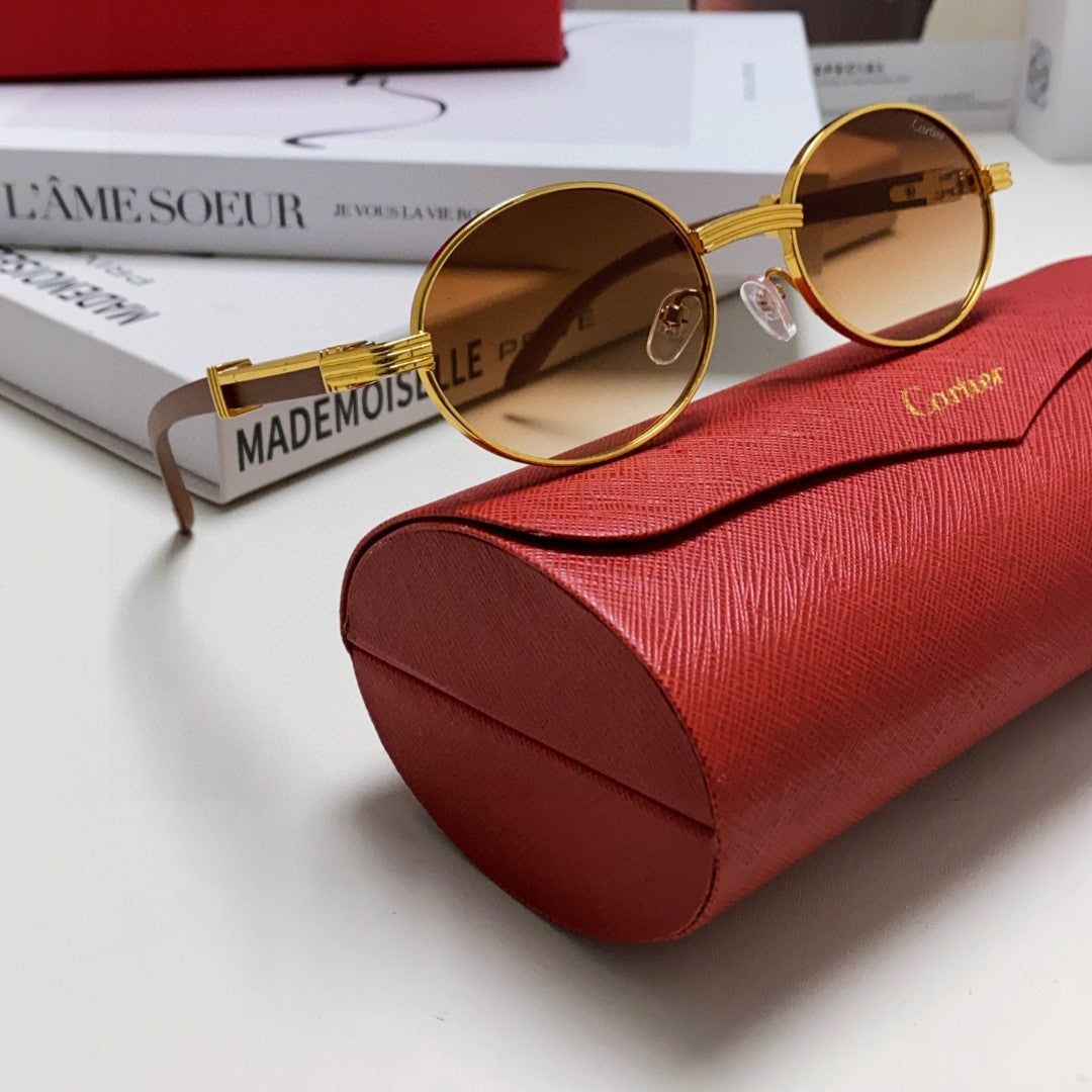 CARTIER PREMIÈRE ROUND FRAME SUNGLASSES CT0464S IN METAL
