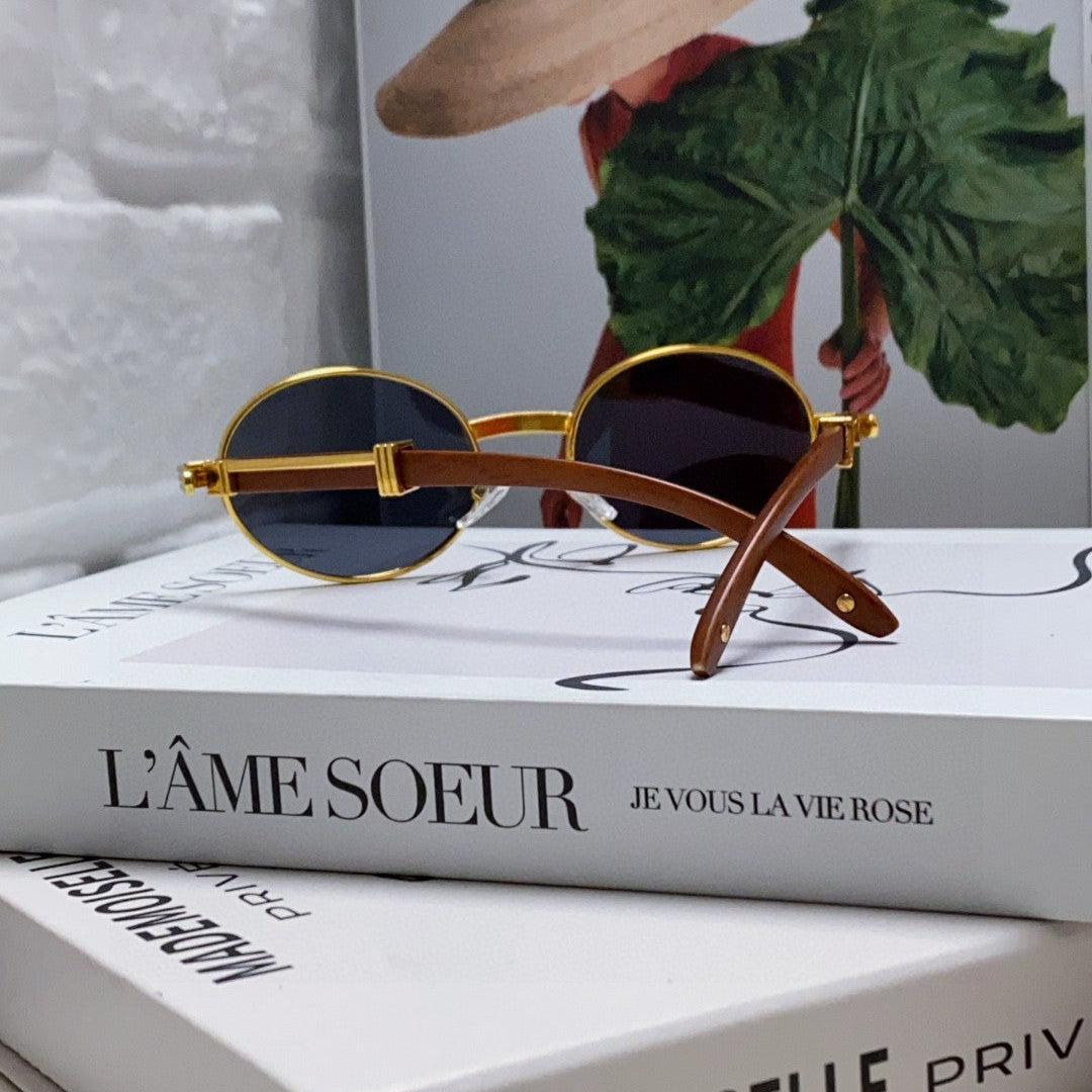 CARTIER PREMIÈRE ROUND FRAME SUNGLASSES CT0464S IN METAL