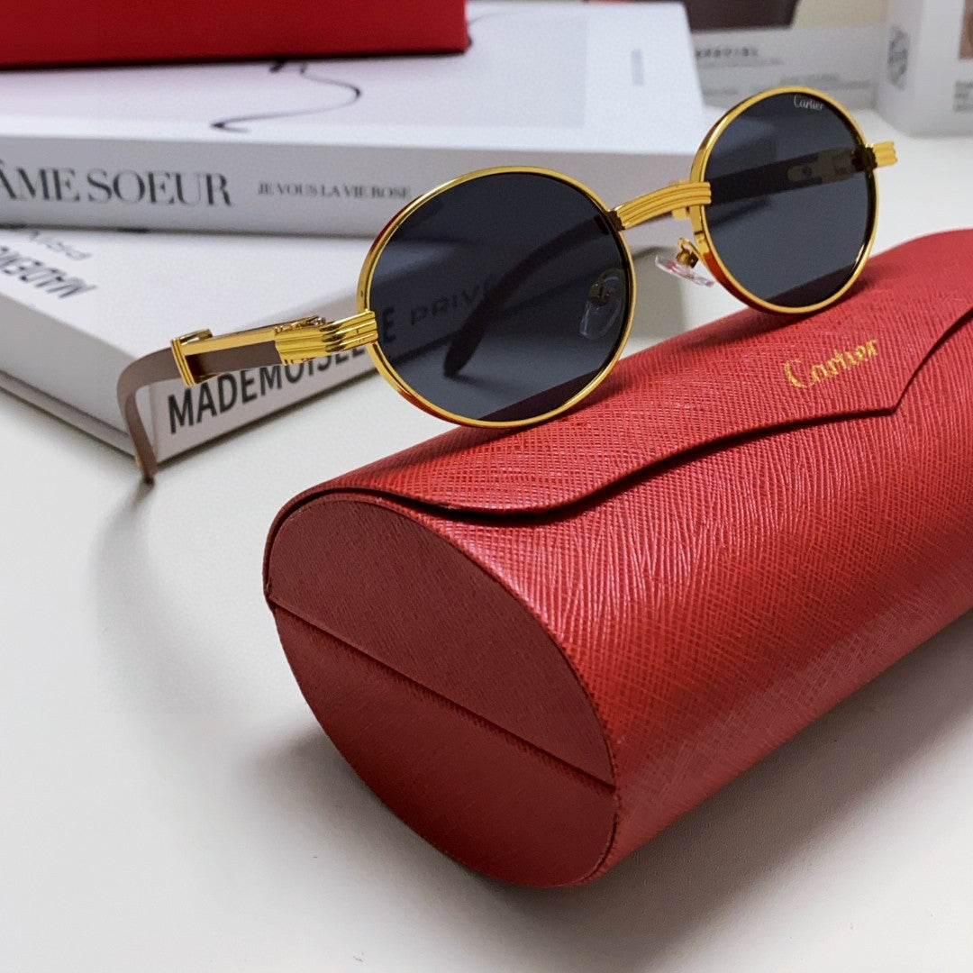 CARTIER PREMIÈRE ROUND FRAME SUNGLASSES CT0464S IN METAL