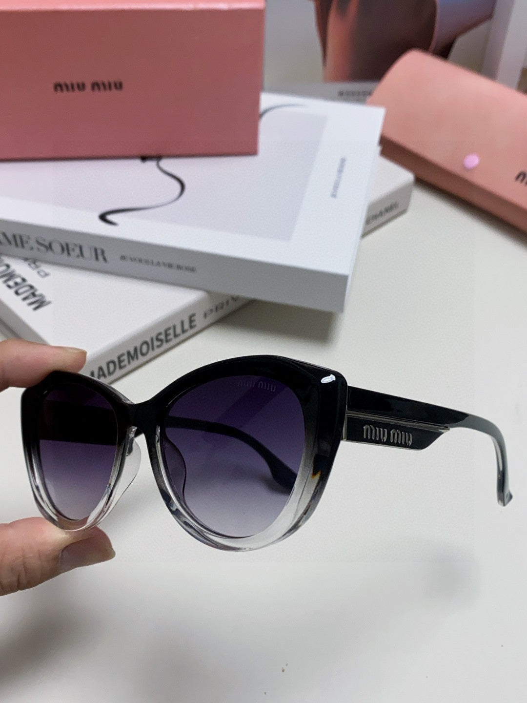 MIU MIU GLIMPSE SUNGLASSES 576813 IN BLACK AND CLEAR ACETATE