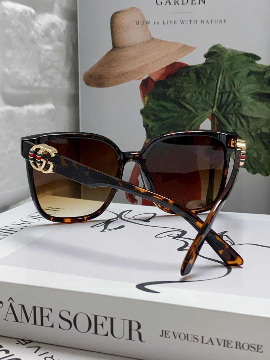 GUCCI EMBOSSED LOGO BUTTERFLY FRAME SUNGLASSES 576876 IN ACETATE
