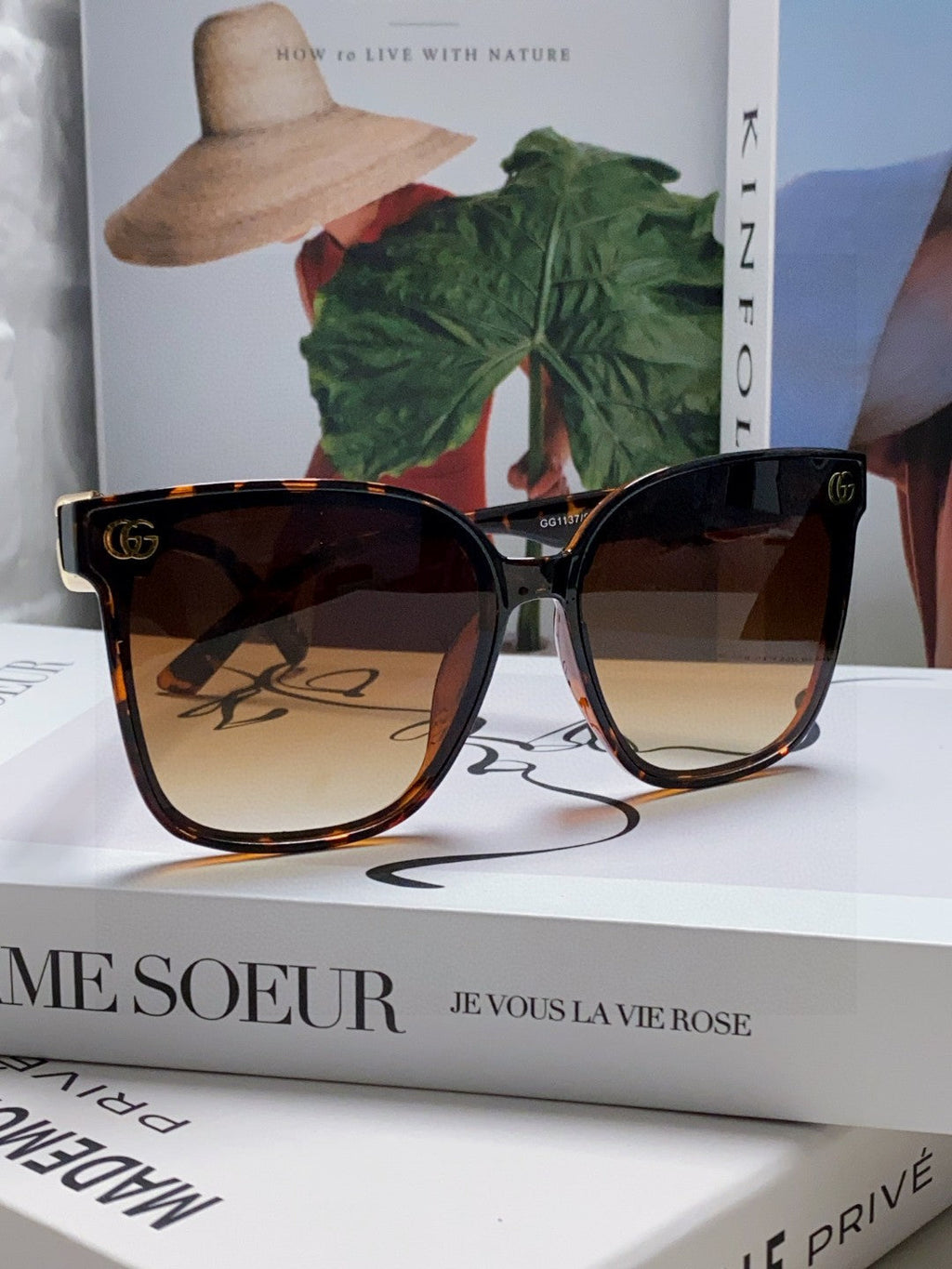 GUCCI EMBOSSED LOGO BUTTERFLY FRAME SUNGLASSES 576876 IN ACETATE