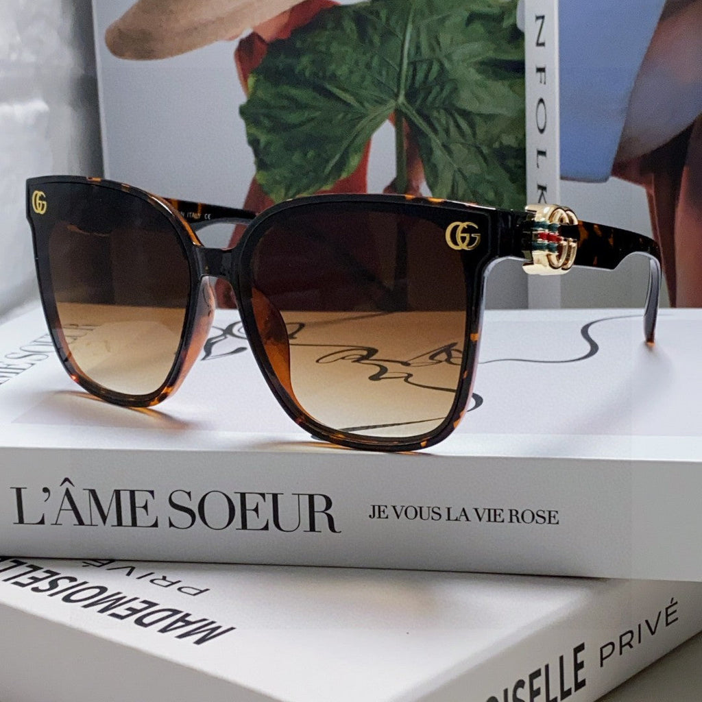 GUCCI EMBOSSED LOGO BUTTERFLY FRAME SUNGLASSES 576876 IN ACETATE