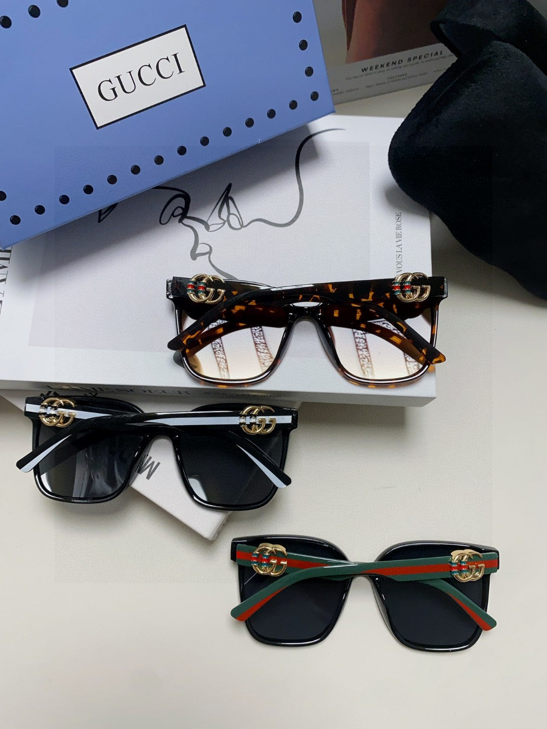 GUCCI EMBOSSED LOGO BUTTERFLY FRAME SUNGLASSES 576876 IN ACETATE
