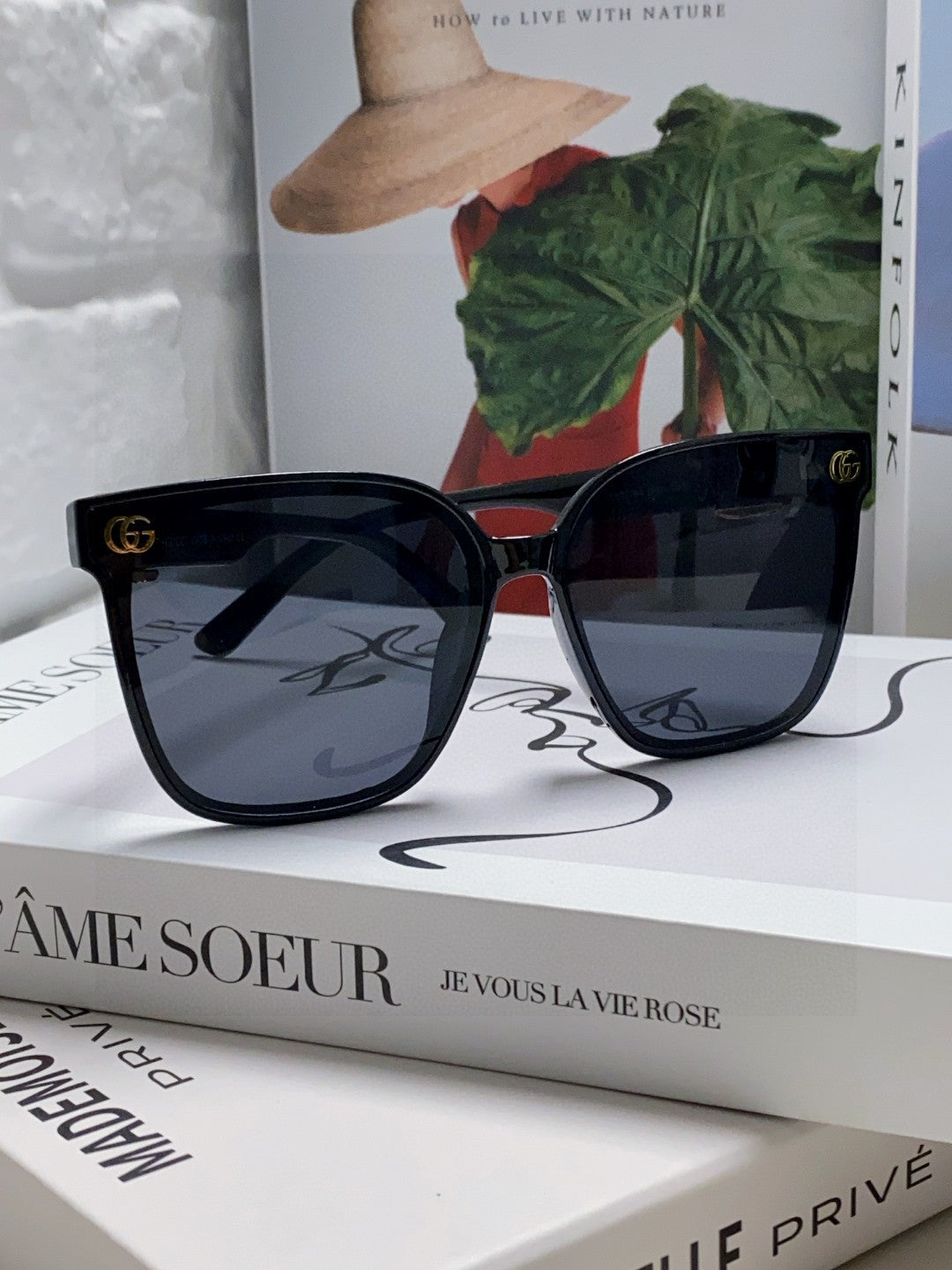 GUCCI EMBOSSED LOGO BUTTERFLY FRAME SUNGLASSES 576876 IN ACETATE