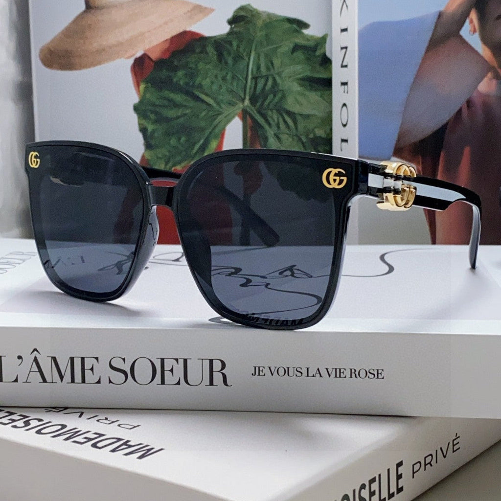 GUCCI EMBOSSED LOGO BUTTERFLY FRAME SUNGLASSES 576876 IN ACETATE