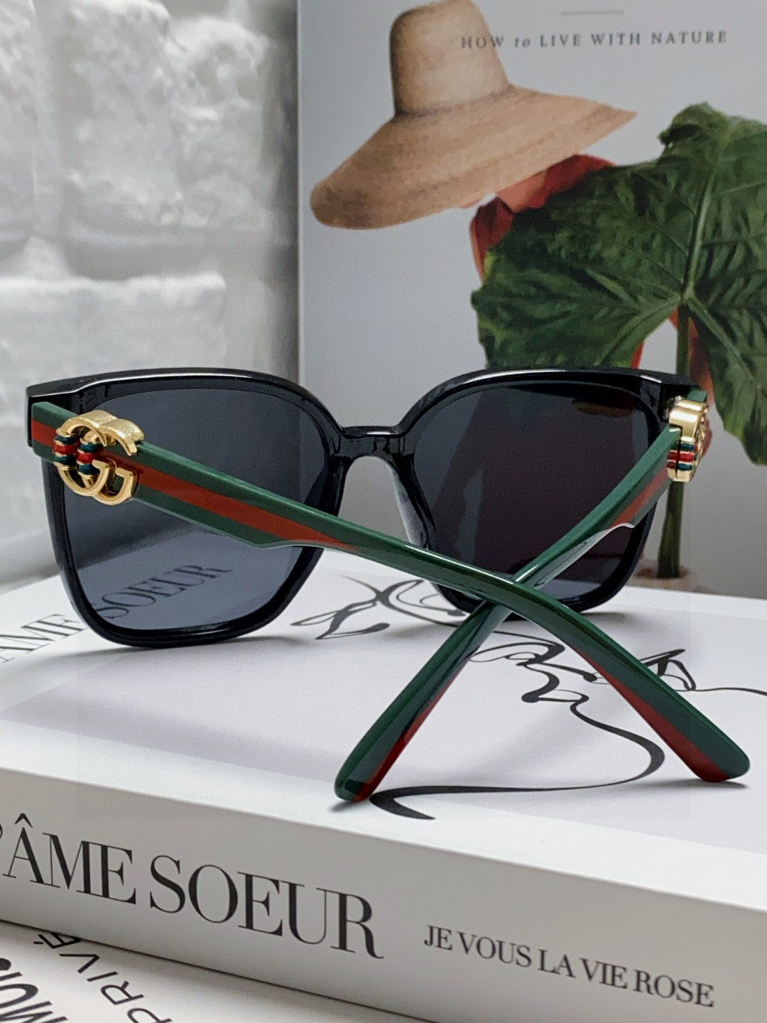 GUCCI EMBOSSED LOGO BUTTERFLY FRAME SUNGLASSES 576876 IN ACETATE