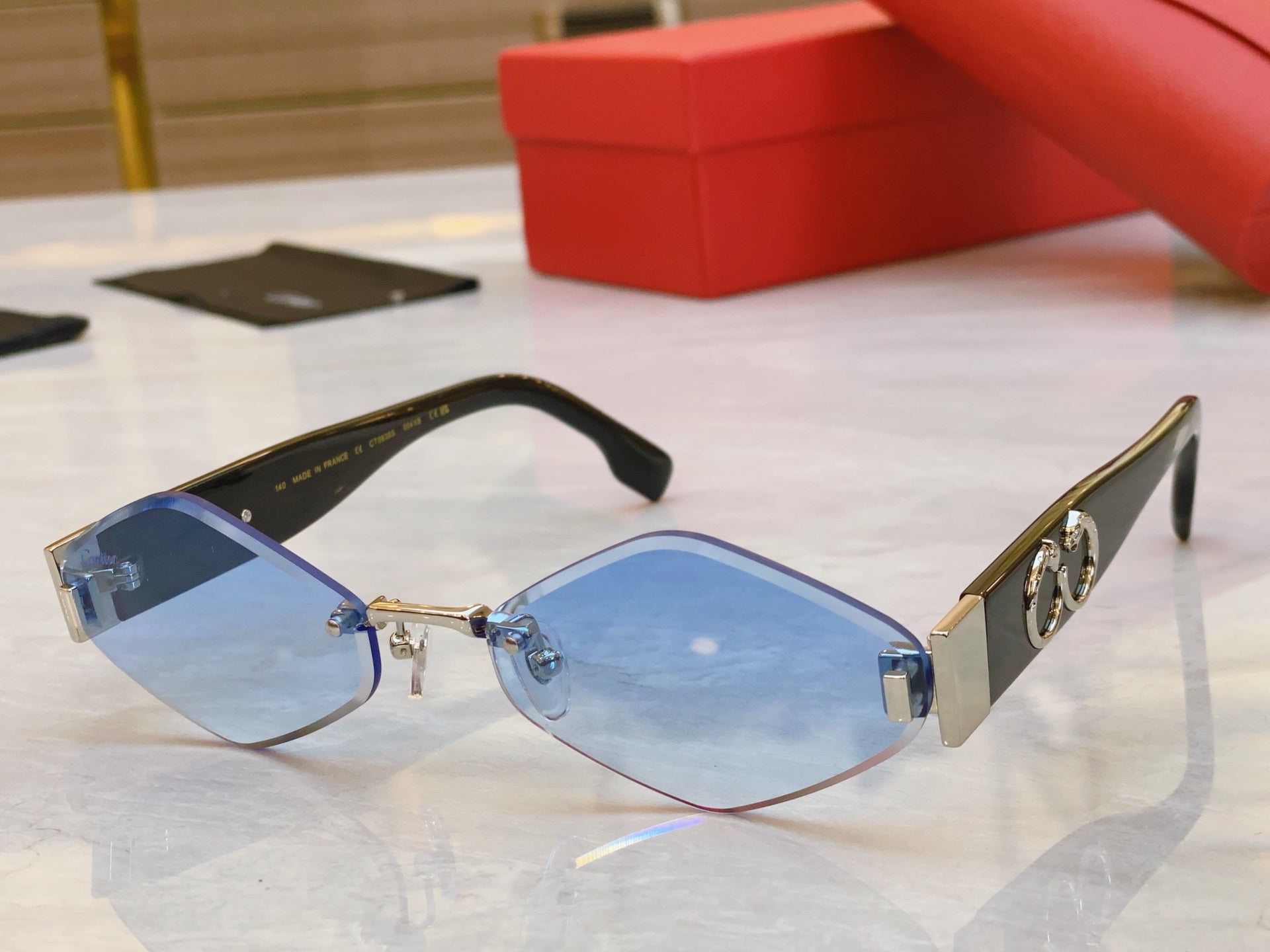CARTIER PANTHÈRE RHOMBUS FRAME SUNGLASSES CT00638S IN METAL AND ACETATE