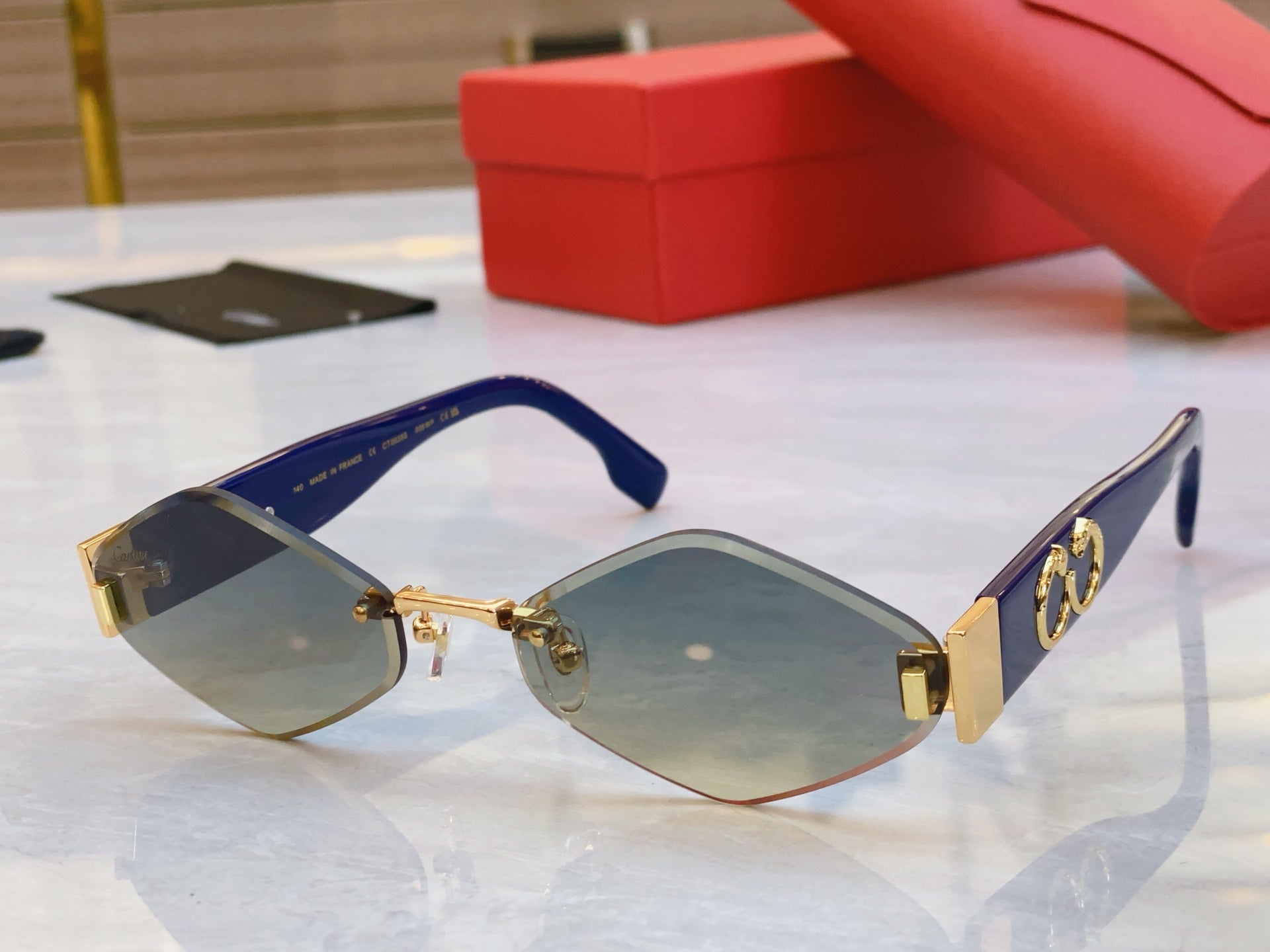 CARTIER PANTHÈRE RHOMBUS FRAME SUNGLASSES CT00638S IN METAL AND ACETATE