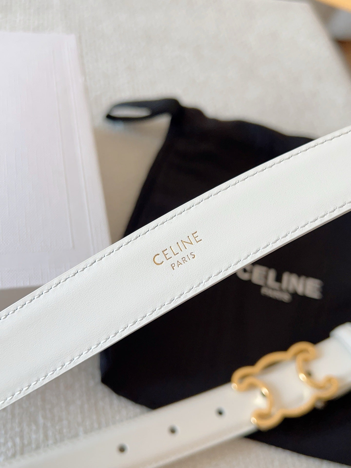 CELINE BELT 25MM TRIOMPHE LOGO CUT-OUT IN WHITE SMOOTH CALFSKIN WITH GOLD BUCKLE