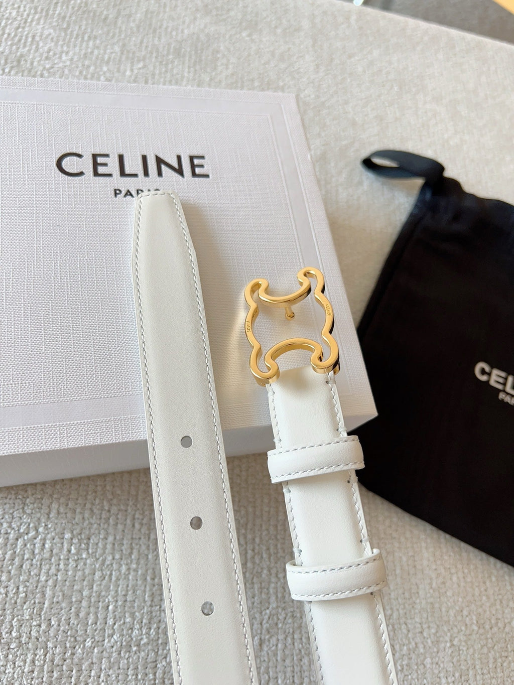 CELINE BELT 25MM TRIOMPHE LOGO CUT-OUT IN WHITE SMOOTH CALFSKIN WITH GOLD BUCKLE