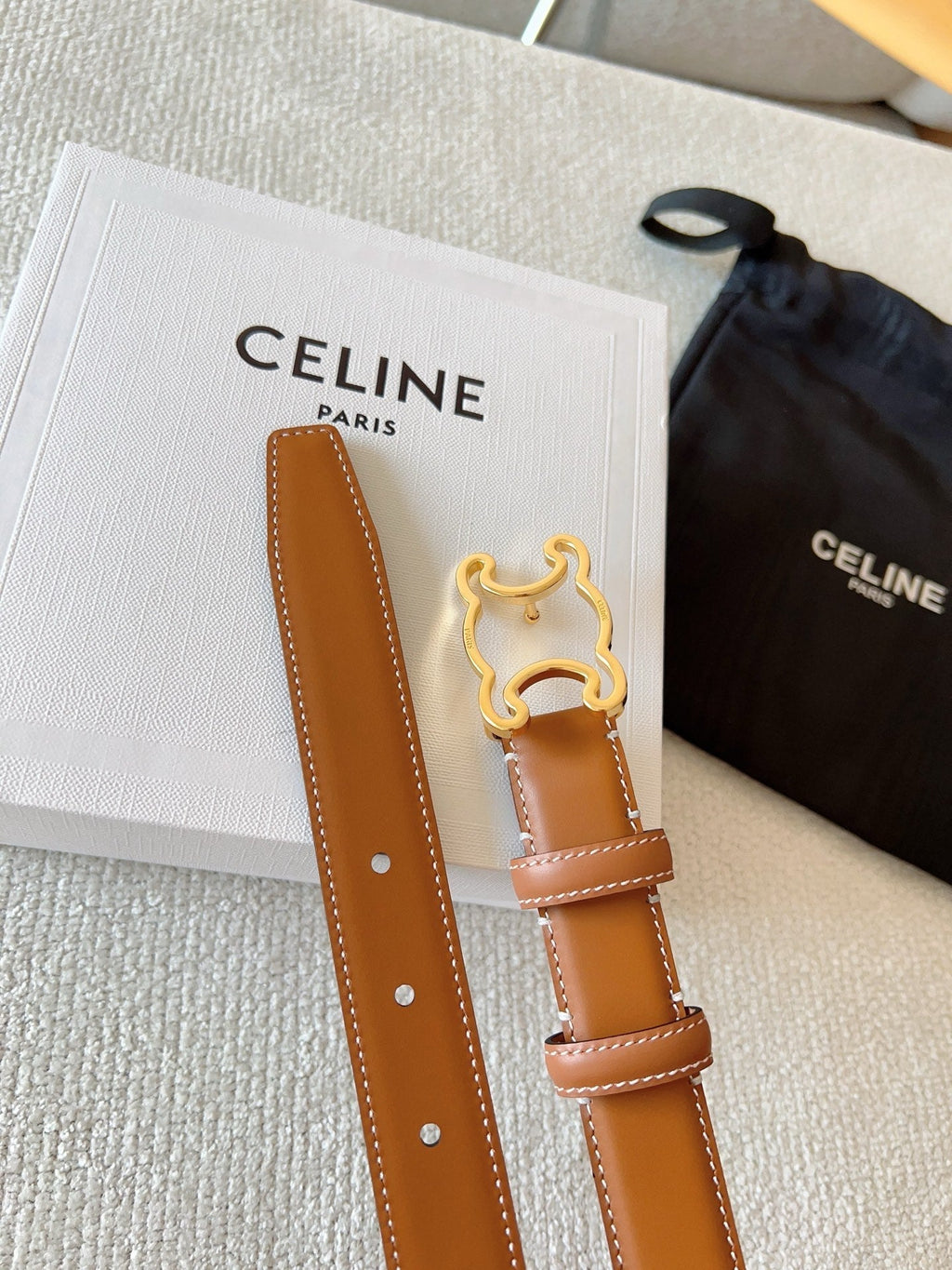 CELINE BELT 25MM TRIOMPHE LOGO CUT-OUT IN BROWN SMOOTH CALFSKIN WITH GOLD BUCKLE