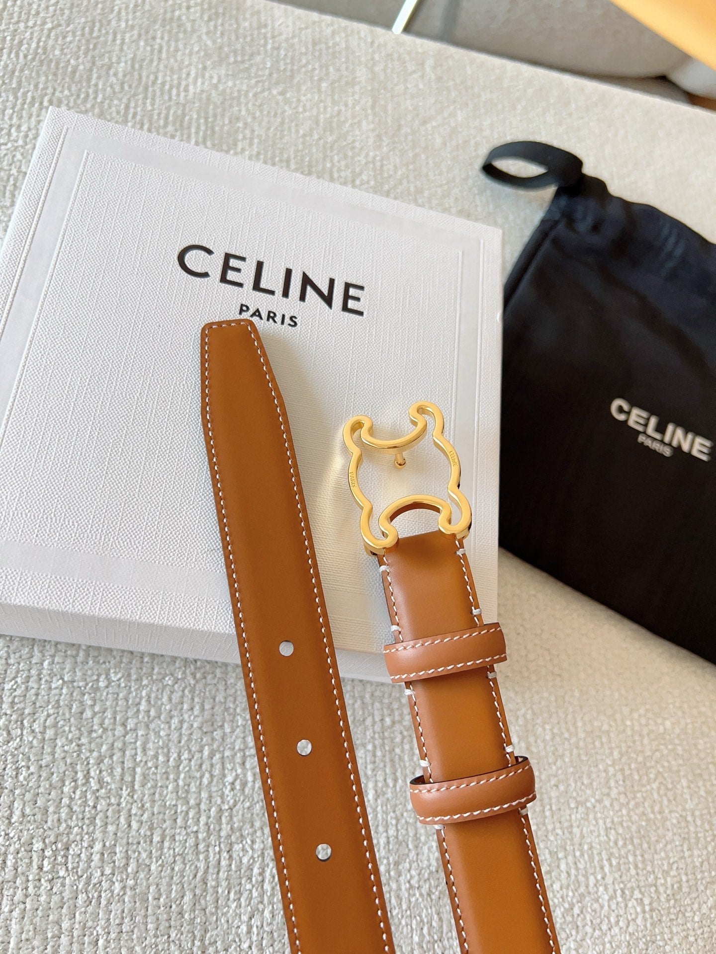 CELINE BELT 25MM TRIOMPHE LOGO CUT-OUT IN BROWN SMOOTH CALFSKIN WITH GOLD BUCKLE