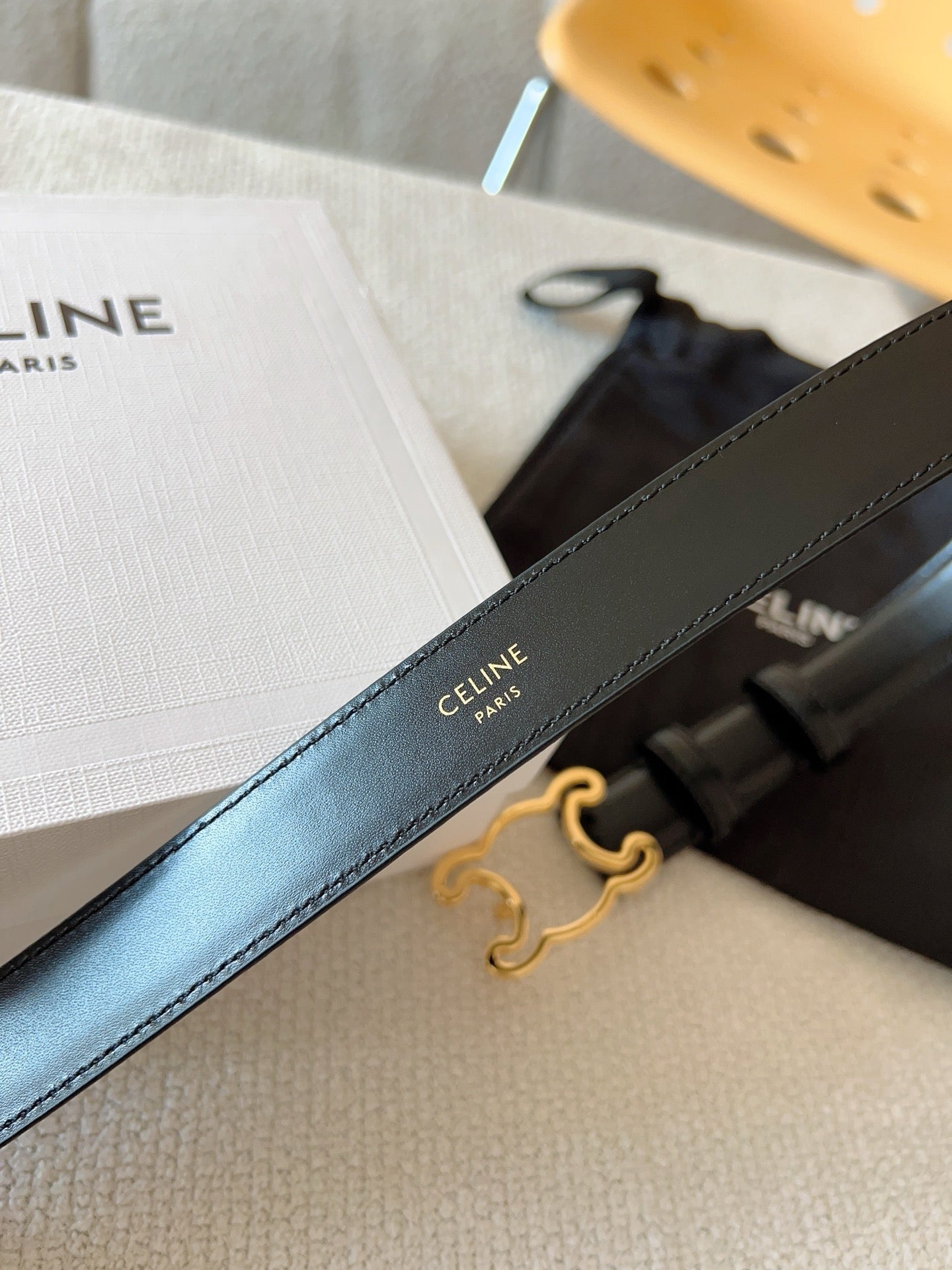 CELINE BELT 25MM TRIOMPHE LOGO CUT-OUT IN SMOOTH BLACK CALFSKIN WITH GOLD BUCKLE