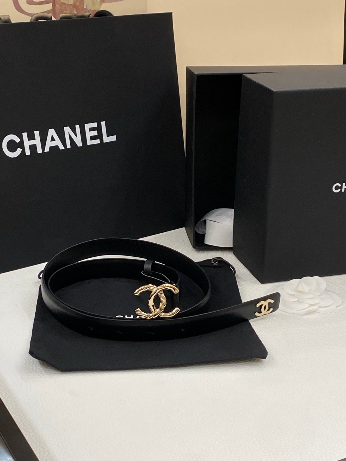 CHANEL DOUBLE C BELT 20MM IN BLACK CALFSKIN WITH GOLD-TONE CHAIN INTERWOVEN BUCKLE